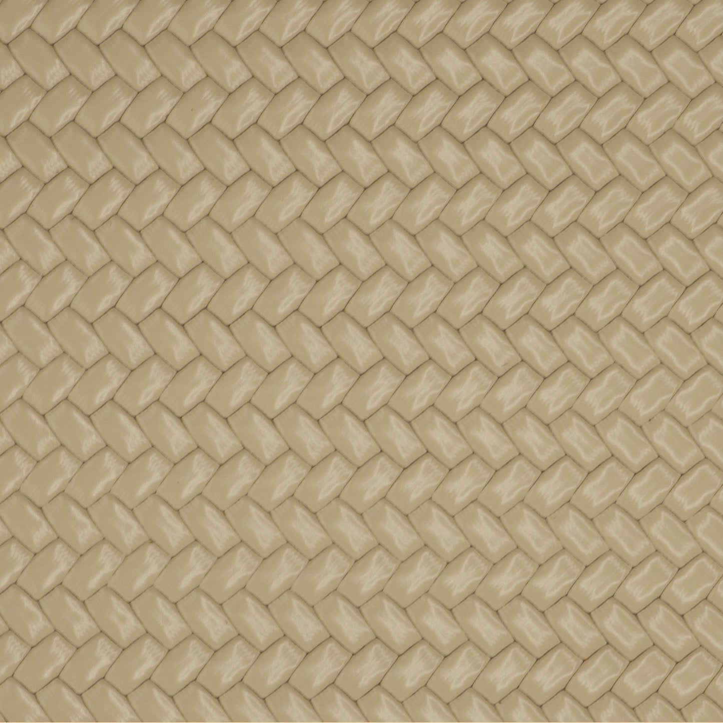 Beige textured material with a repeating diamond-patterned woven or embossed surface.