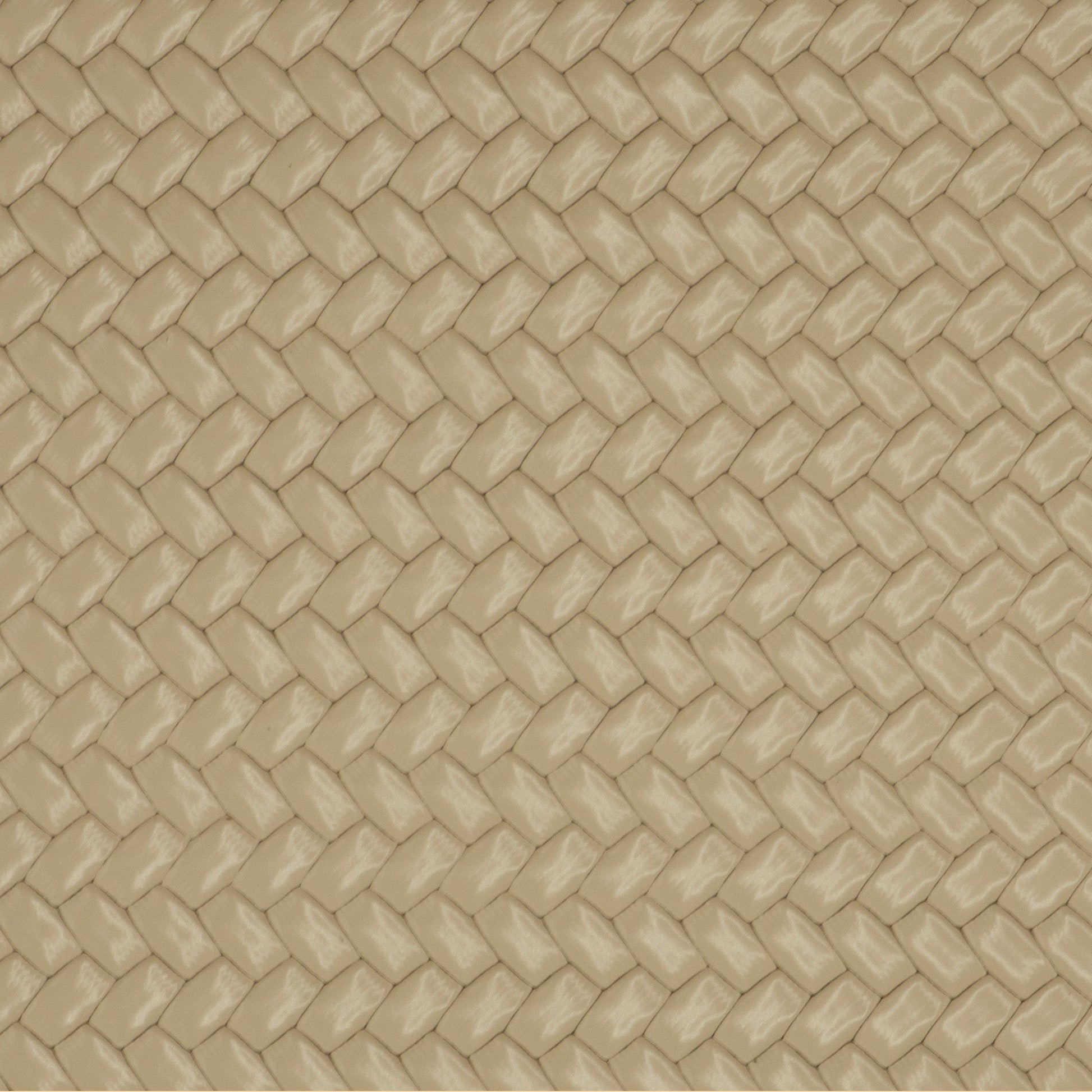 Beige textured material with a repeating diamond-patterned woven or embossed surface.